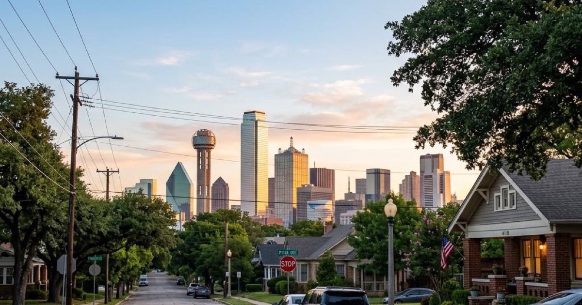 Residential street in Dallas, TX with the downtown skyline in the background